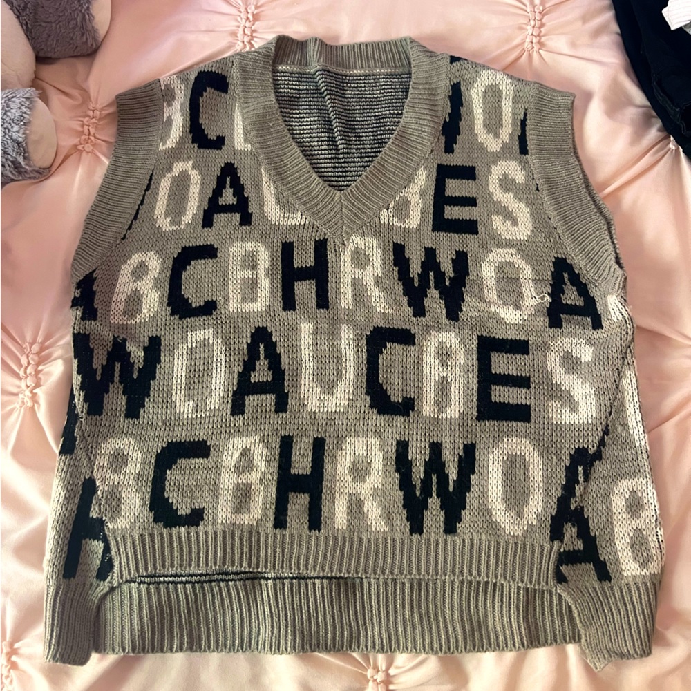 Grey sweater vest